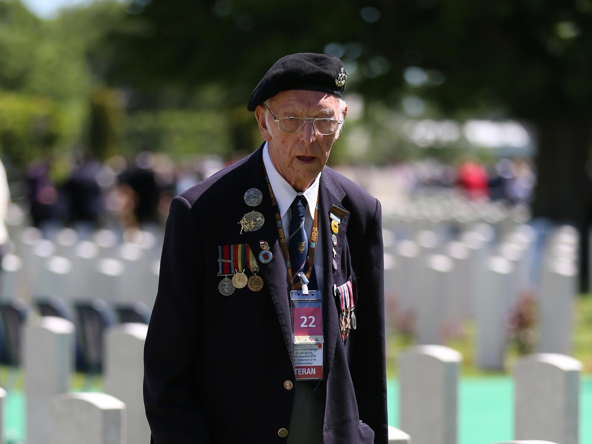 Veteran Bert Banford, 90, in Bayeux Cemetery after the memorial service