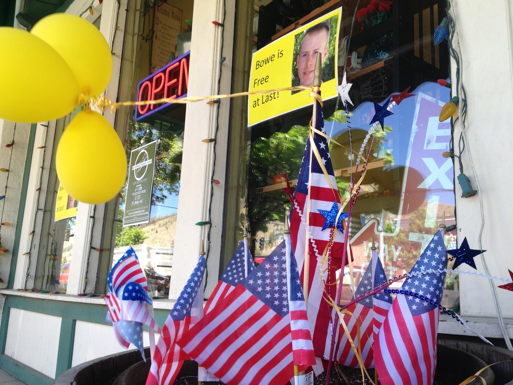 Flags and balloons marking the release from captivity of Sgt. Bowe Bergdahl adorn the sidewalk outside a shop in the soldier's hometown of Hailey, Idaho