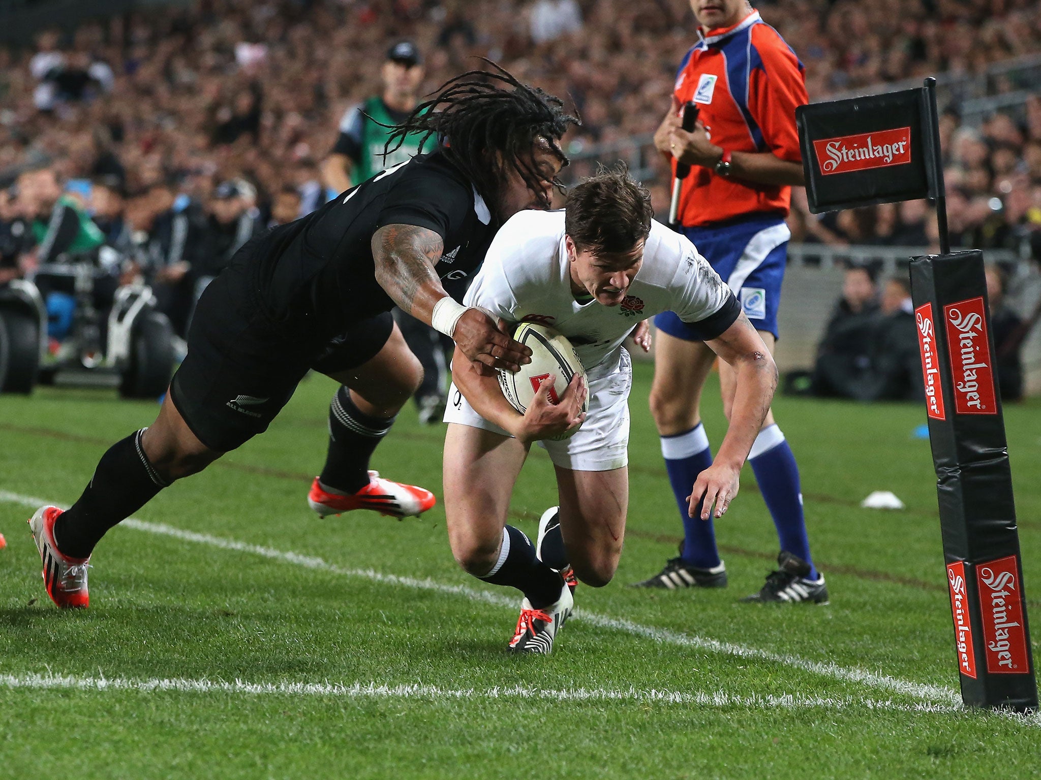 Freddie Burns dives for a try that would be ruled out for a knock on in the 20-15 defeat to New Zealand