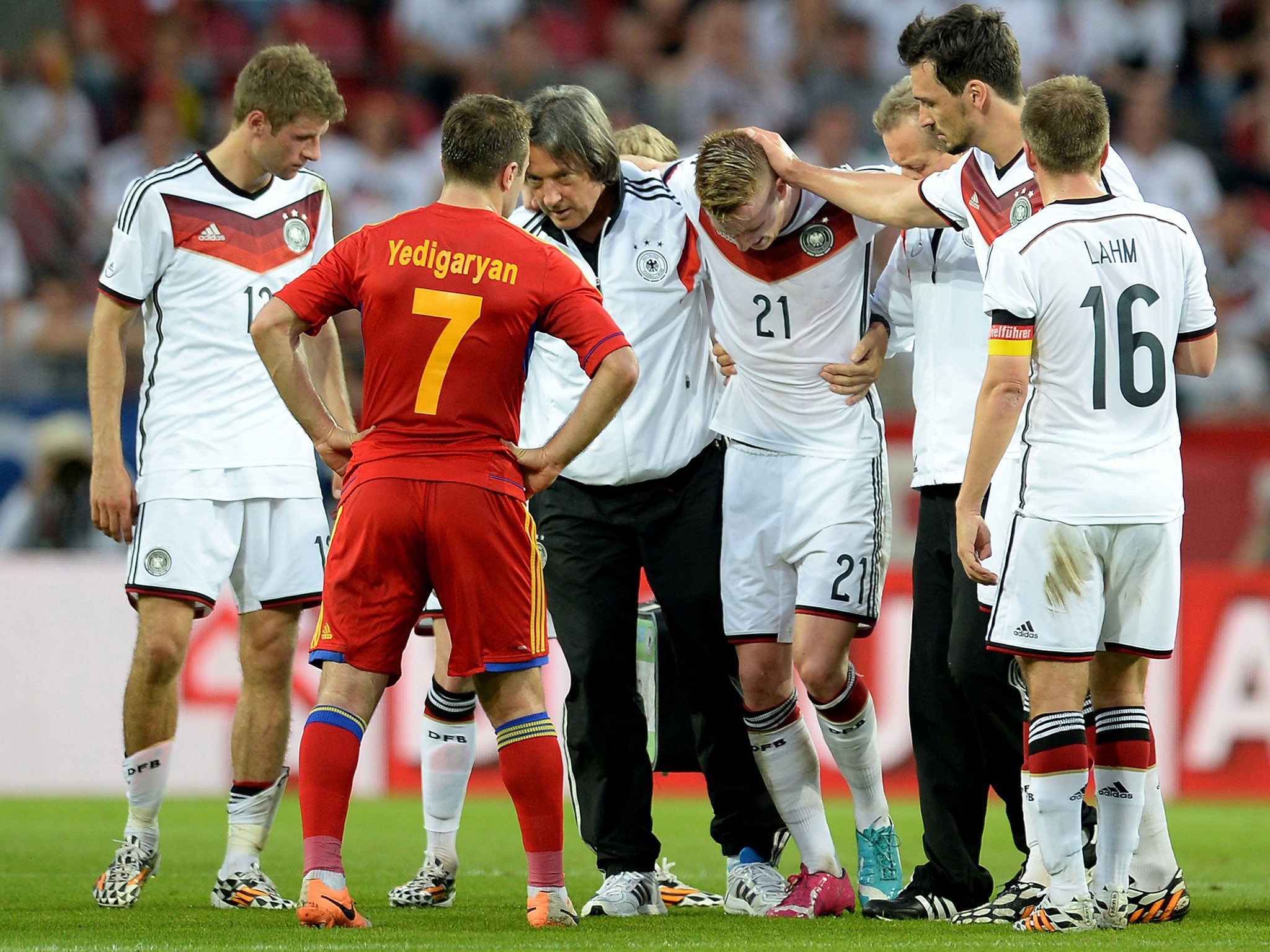 Marco Reus is helped from the pitch after suffering an ankle injury in the friendly between Germany and Armenia