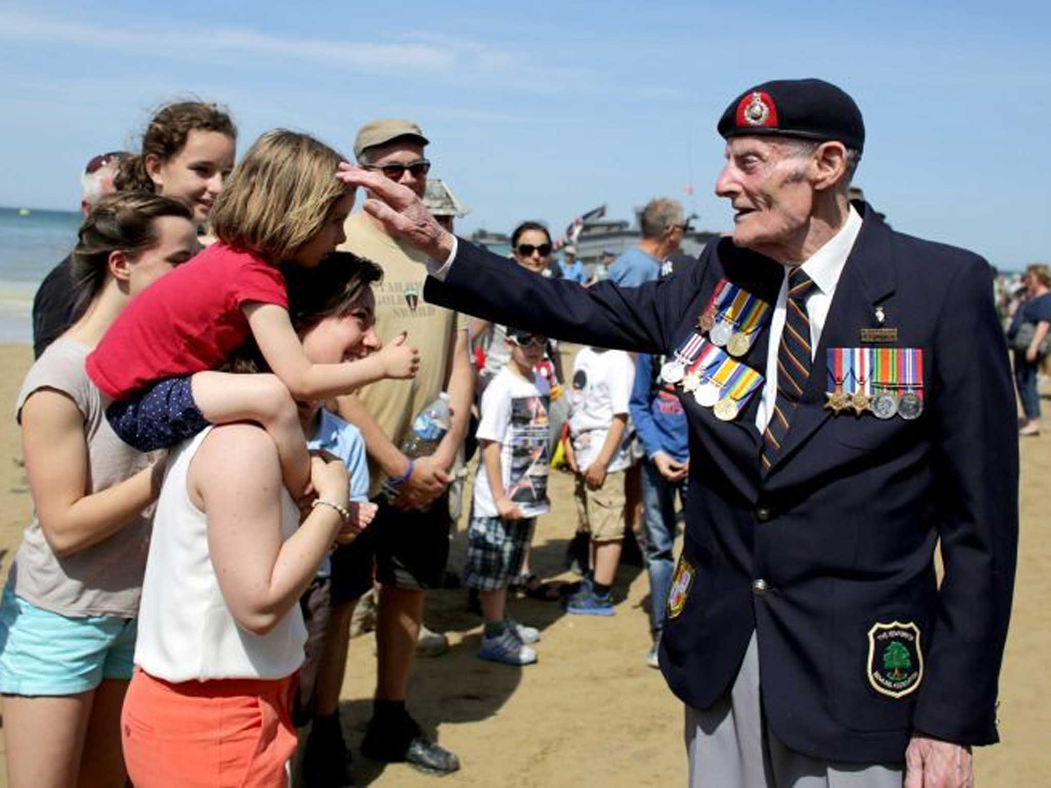 Returning hero: Former Royal Marine Joseph Kellsey, 91, in France on Friday