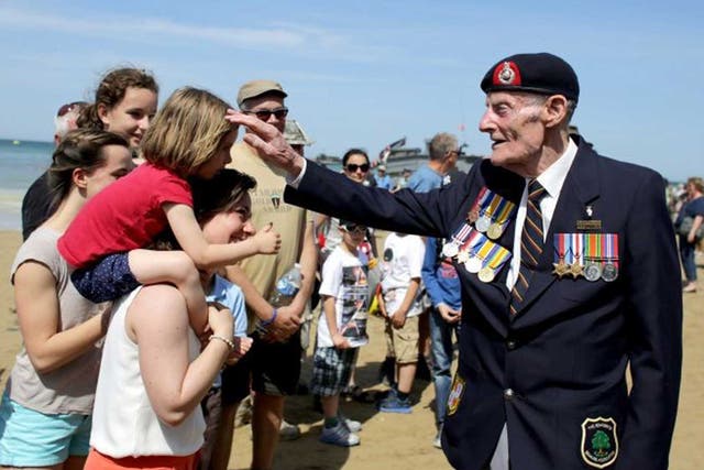 Returning hero: Former Royal Marine Joseph Kellsey, 91, in France on Friday