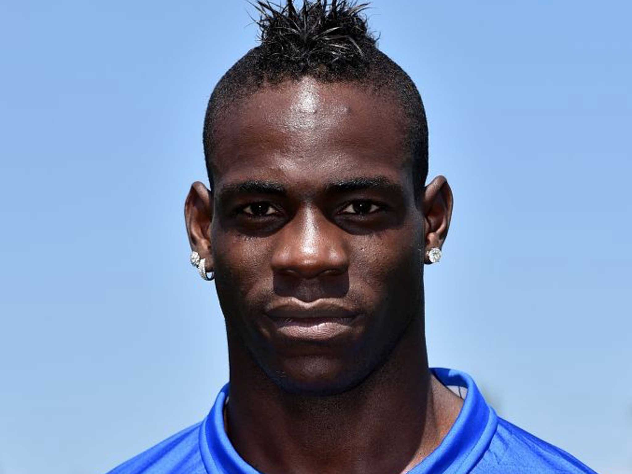 Balotelli of Italy poses during a portrait session