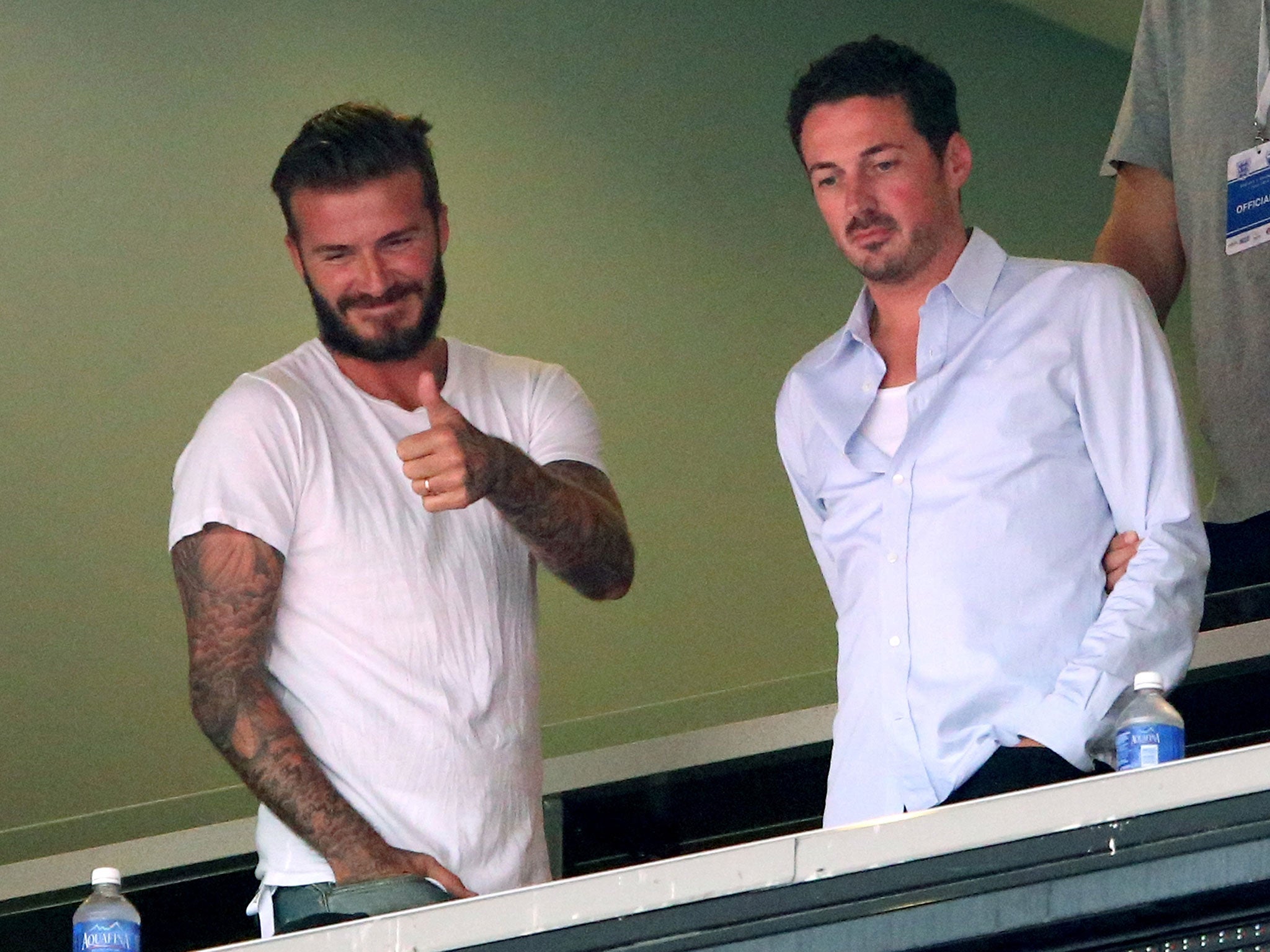 David Beckham gives the thumbs up at Miami's Sun Life Stadium as he watches the goalless draw between England and Miami