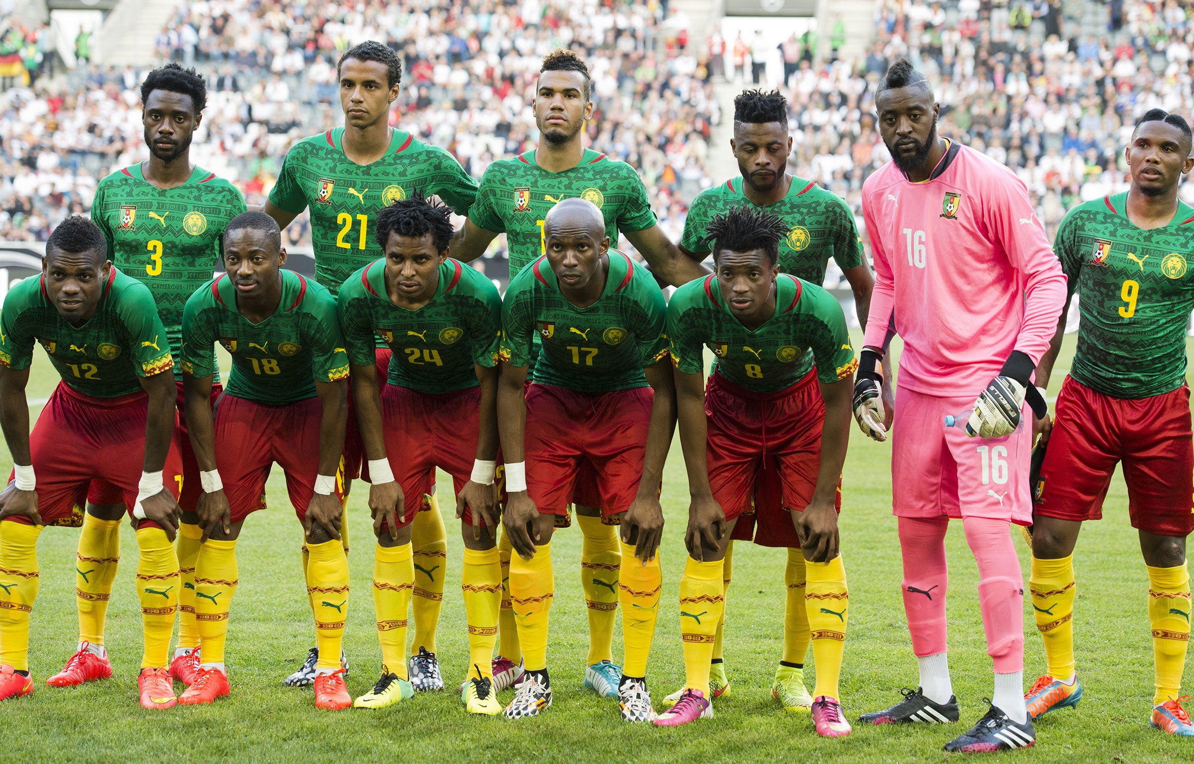 Cameroon's national football team players (1st row, LtoR) Henry Bedimo, Eyong Enoh, Cedric Djeugoue, Stephane Mbia, Benjamin Moukandjou, (2nd row, LtoR) Nicolas N'koulou, Joel Matip, Eric Maxim Choupo-Moting, Alex Song, Charles Itandje, Samuel Eto'o pose