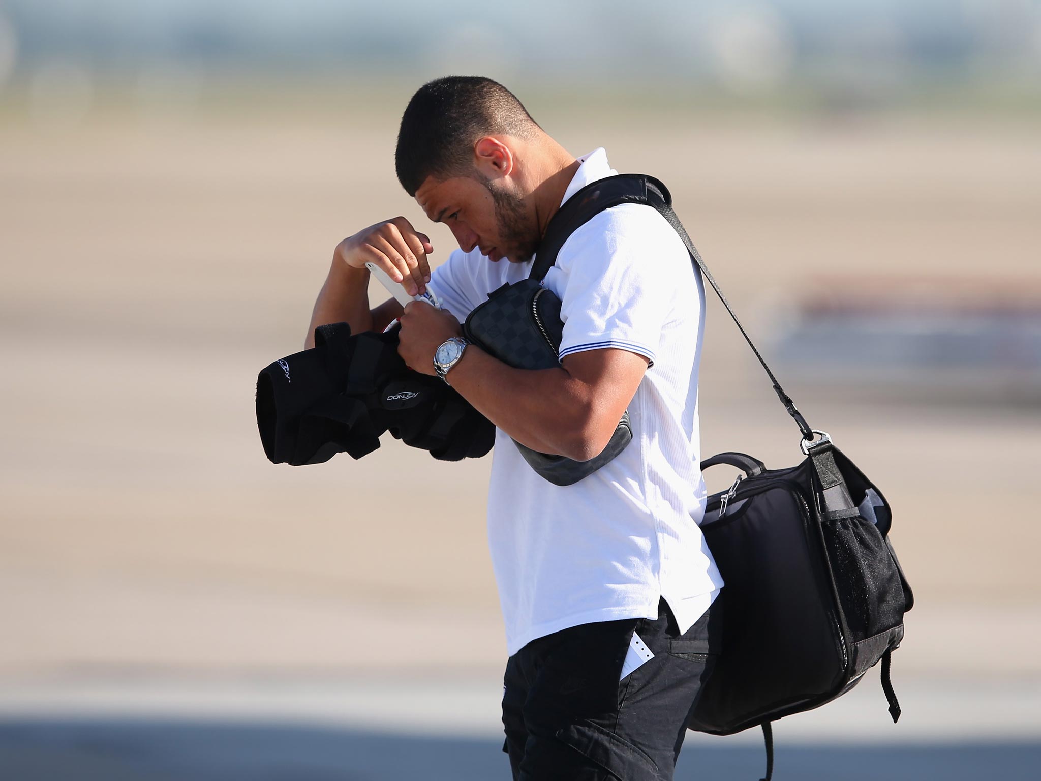 Alex Oxlade-Chamberlain of England arrives into Rio de Janeiro Galeao International Airport