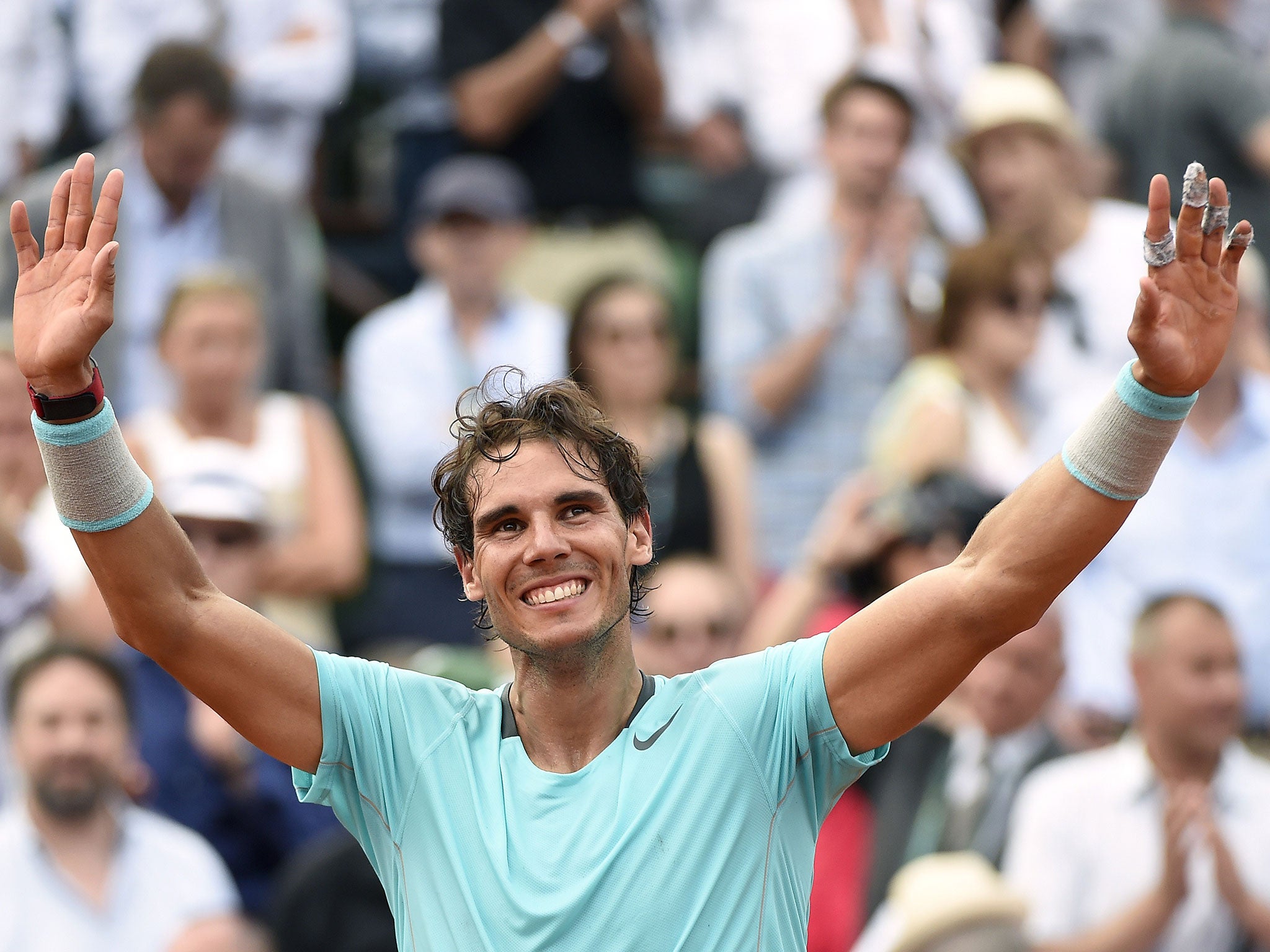 Rafael Nadal celebrates winning the French Open 2014 title after defeating Novak Djokovic