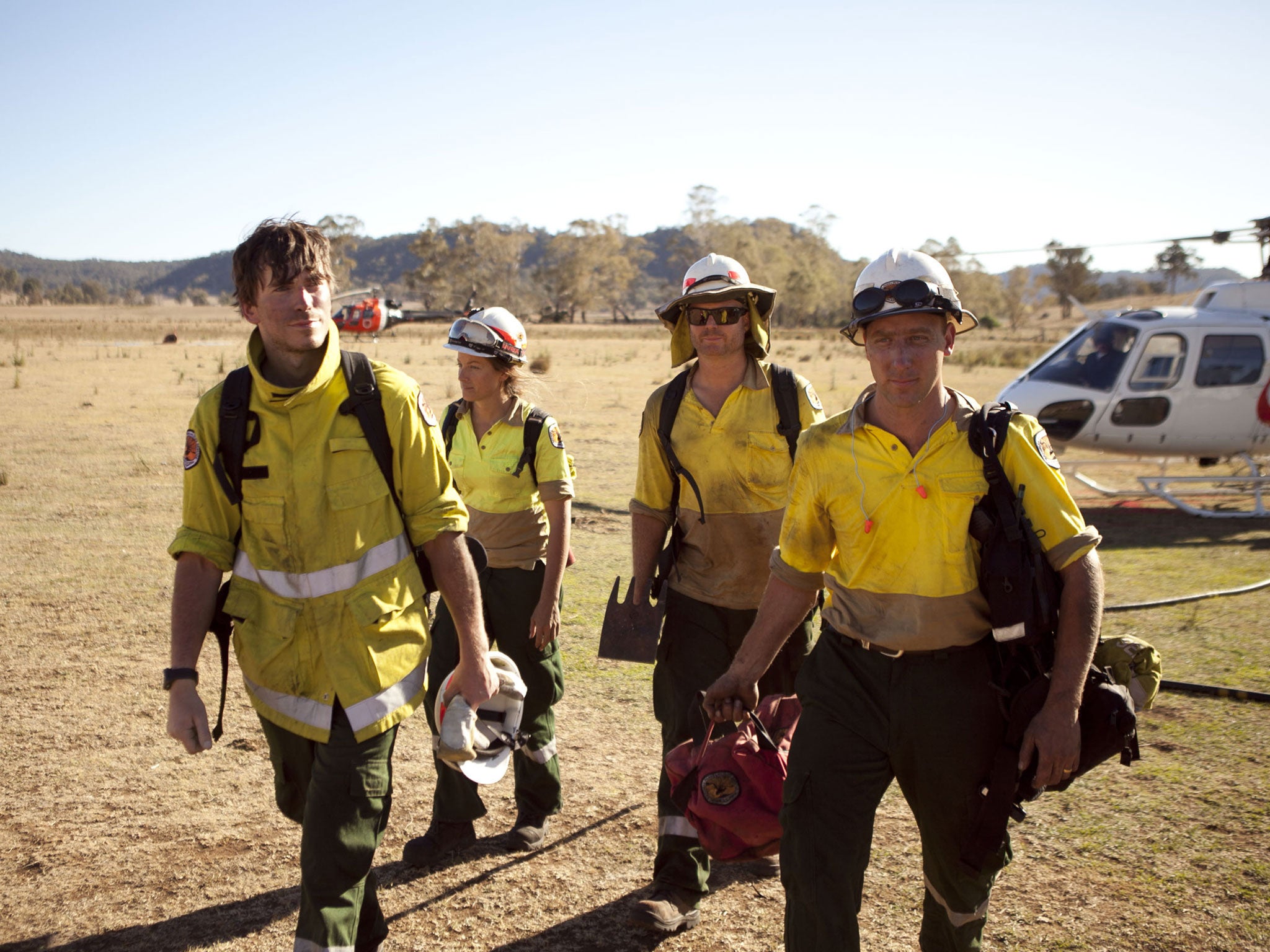 Hot spot: Simon Reeve, left, and Kate Humble, second left, visit Australia in ‘Wildfires 2014: Inside the Inferno’