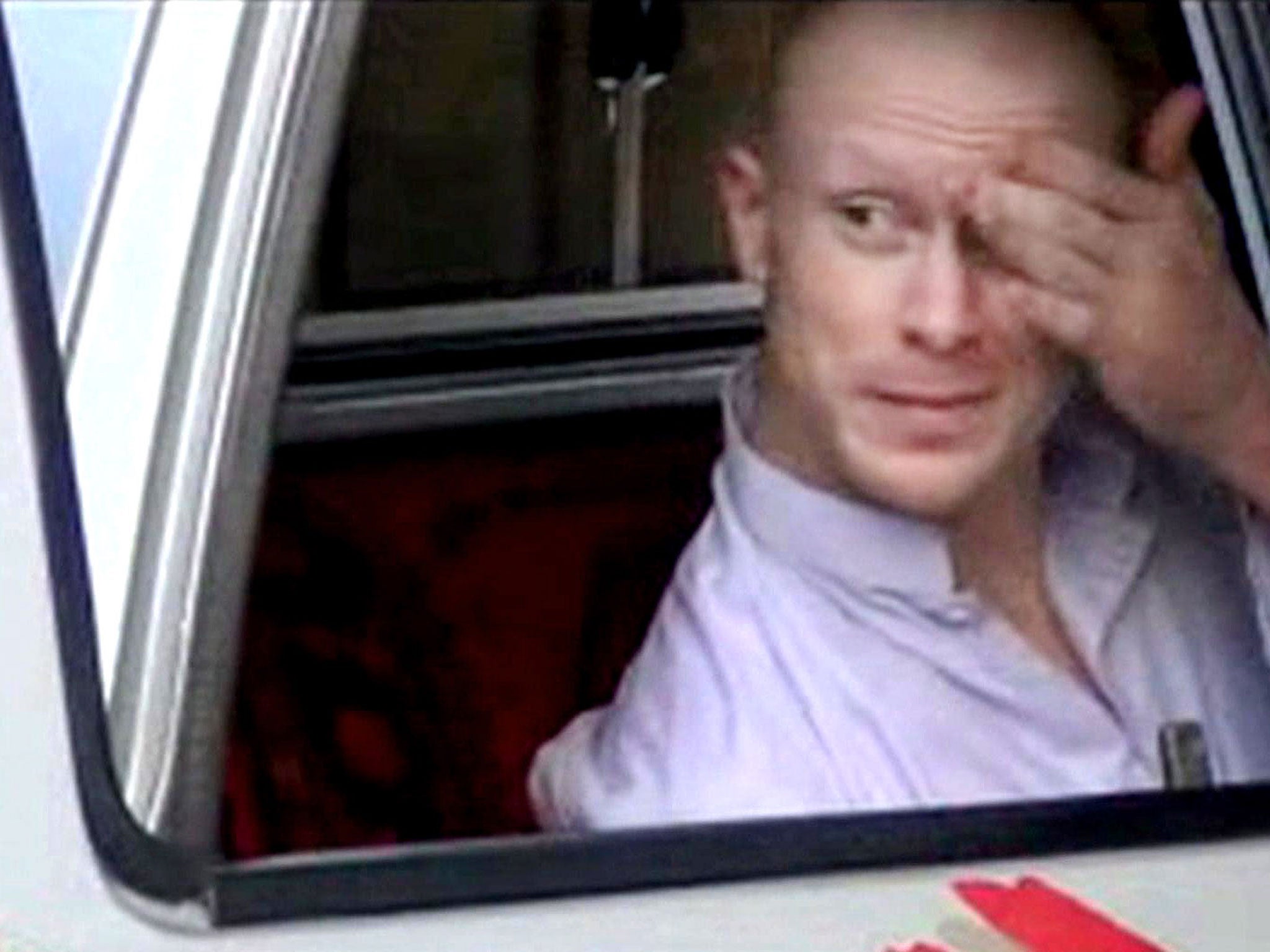 Sgt. Bowe Bergdahl, sits in a vehicle guarded by the Taliban in eastern Afghanistan.