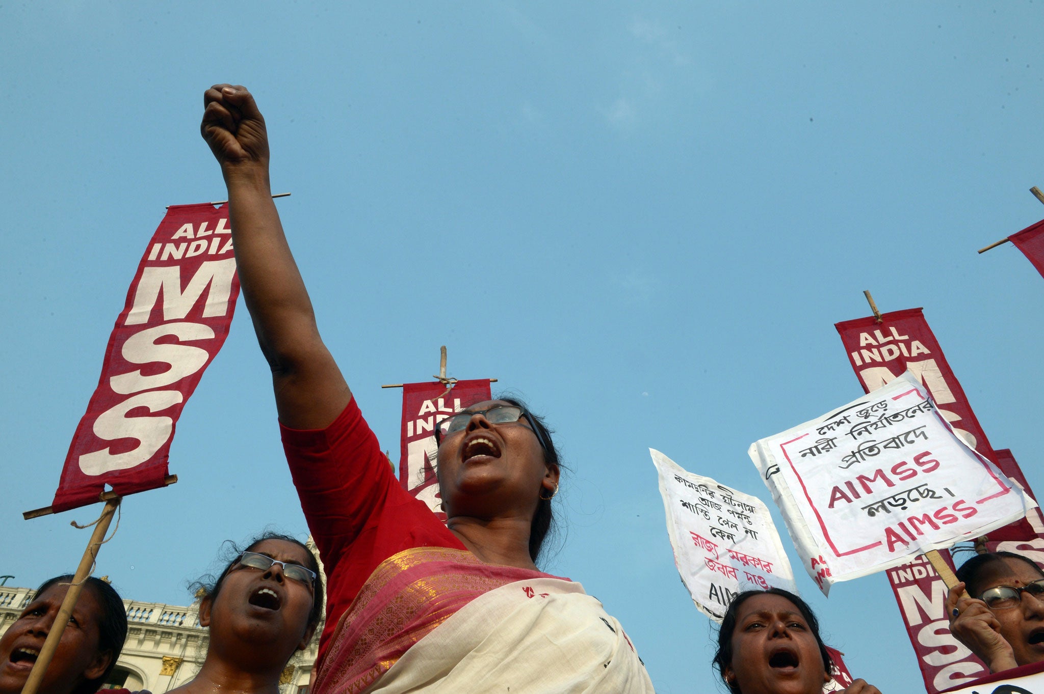 Indian activists from the Social Unity Center of India (SUCI) shout slogans against the state government in protest against the gang rape and murder of two girls in the district of Badaun in the northern state of Uttar Pradesh and recent rapes in the east