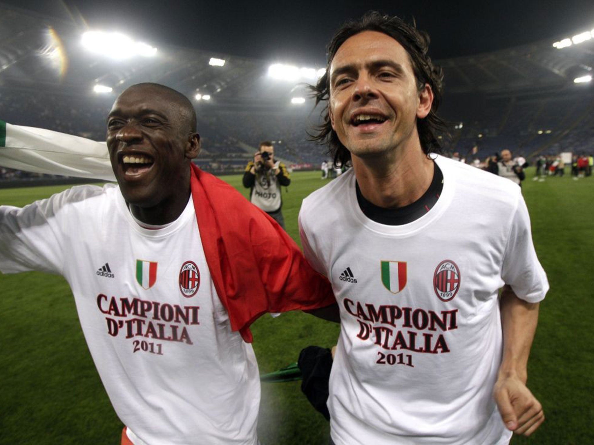 Clarence Seedorf (L) has been sacked by AC Milan, with Filipo Inzaghi (R) appointed as his replacement
