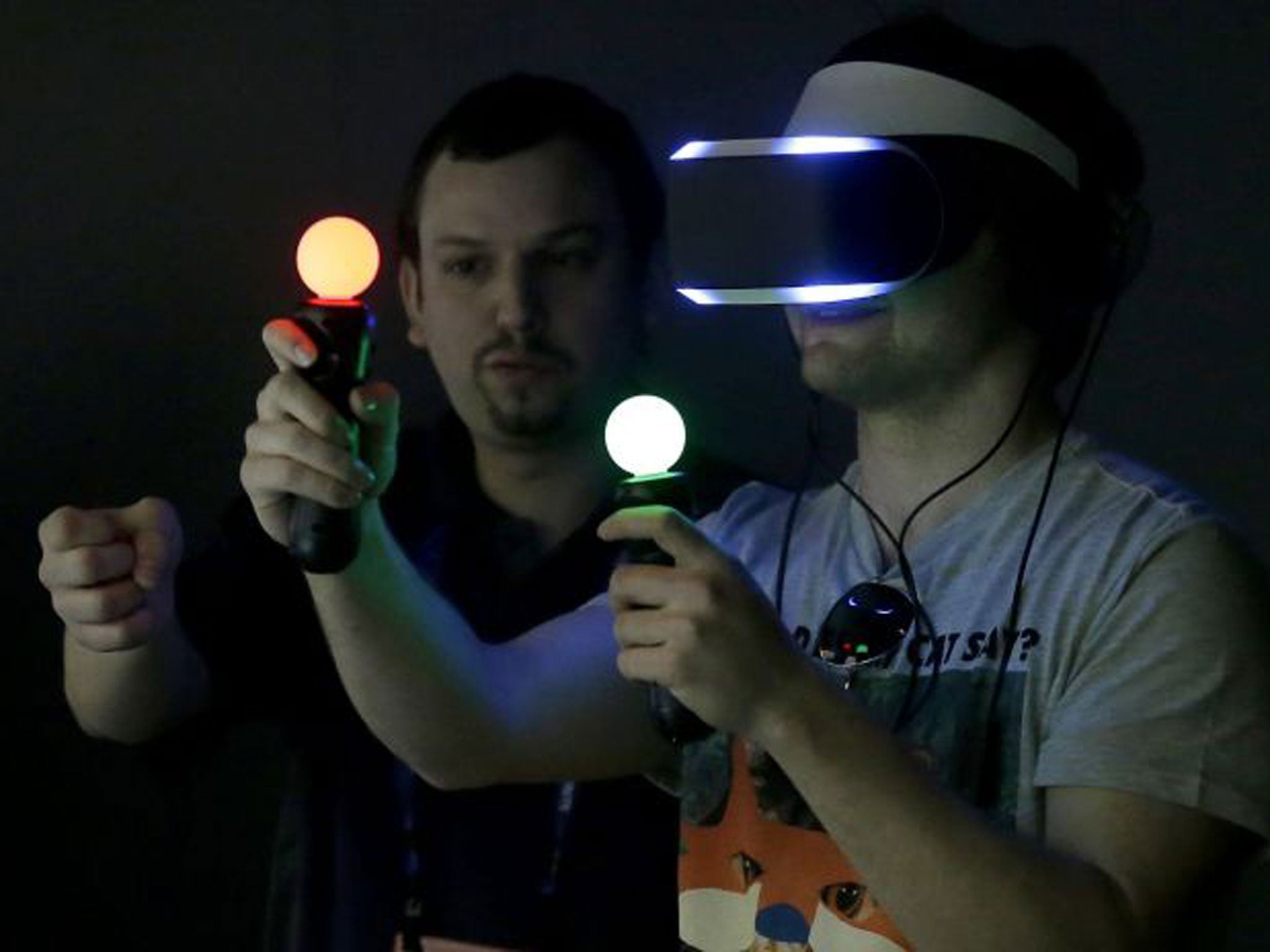 A player tries out the earlier version of Project Morpheus