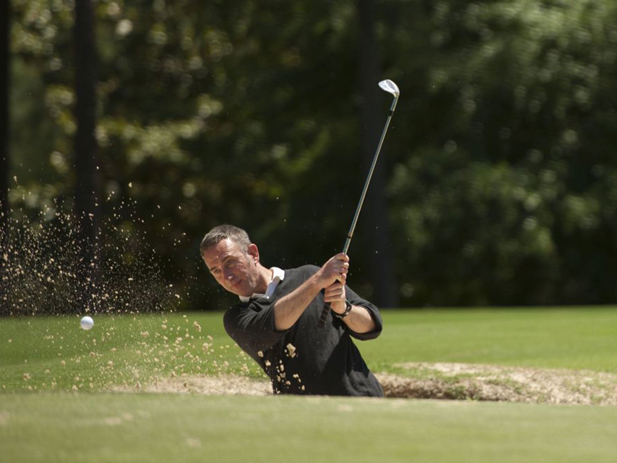 Paul Mahoney grappling with a bunker