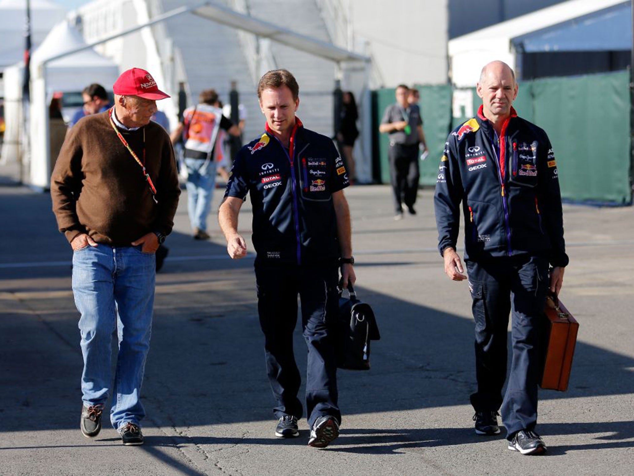 Adrian Newey, far right, will now be allowed to work on design projects involving boats and planes, as well as F1 cars
