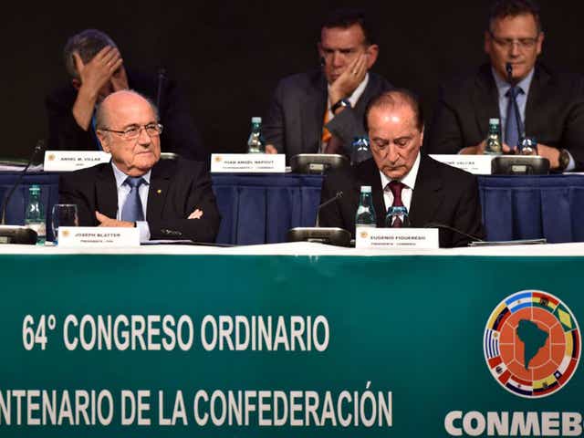 The Fifa president Sepp Blatter, left, holds court in Sao Paulo 