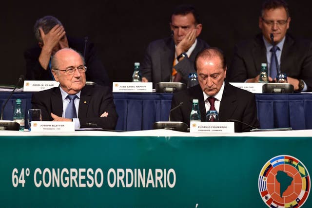 The Fifa president Sepp Blatter, left, holds court in Sao Paulo 