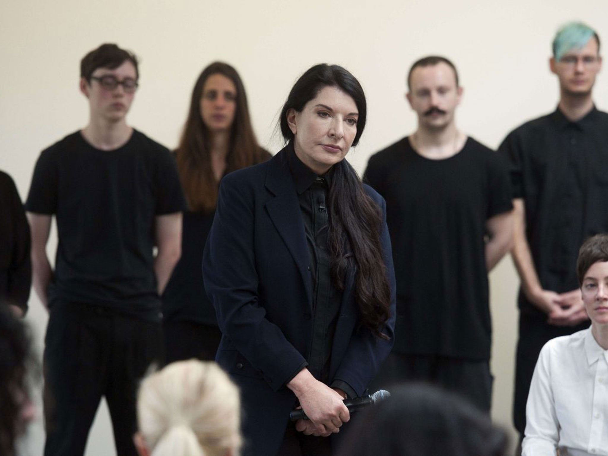 Serbian-born performance artist Marina Abramovic,centre, announces her latest durational performance at the Serpentine Gallery in London
