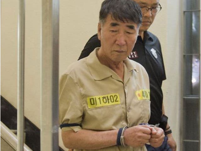 Lee Joon-seok, captain of sunken ferry Sewol, arrives at a court in Gwangju
