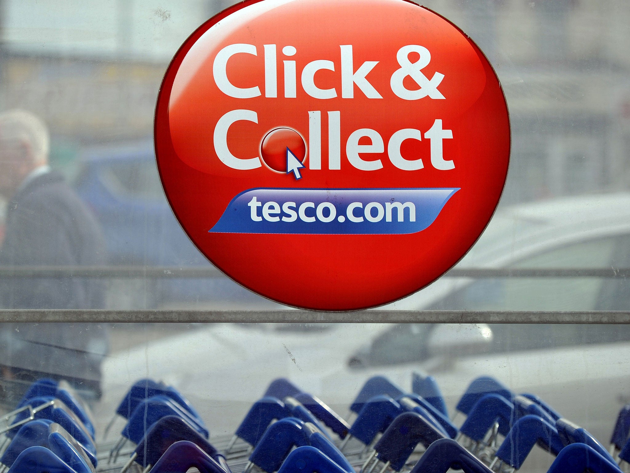 A picture shows signage outside a Tesco store in Liverpool, north west England on April 16, 2014.