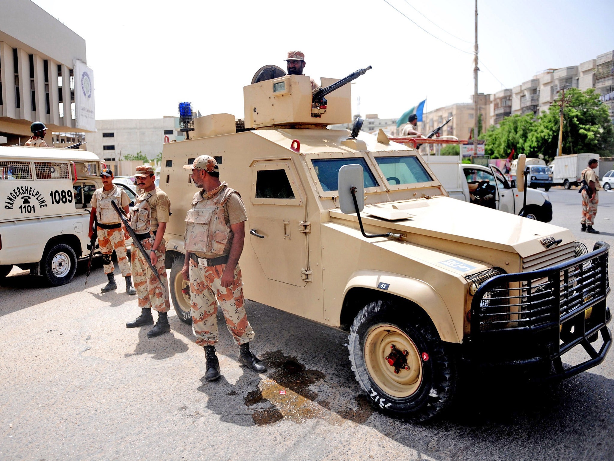 Pakistan rangers take part in a search operation after the firing incident at Karachi airport