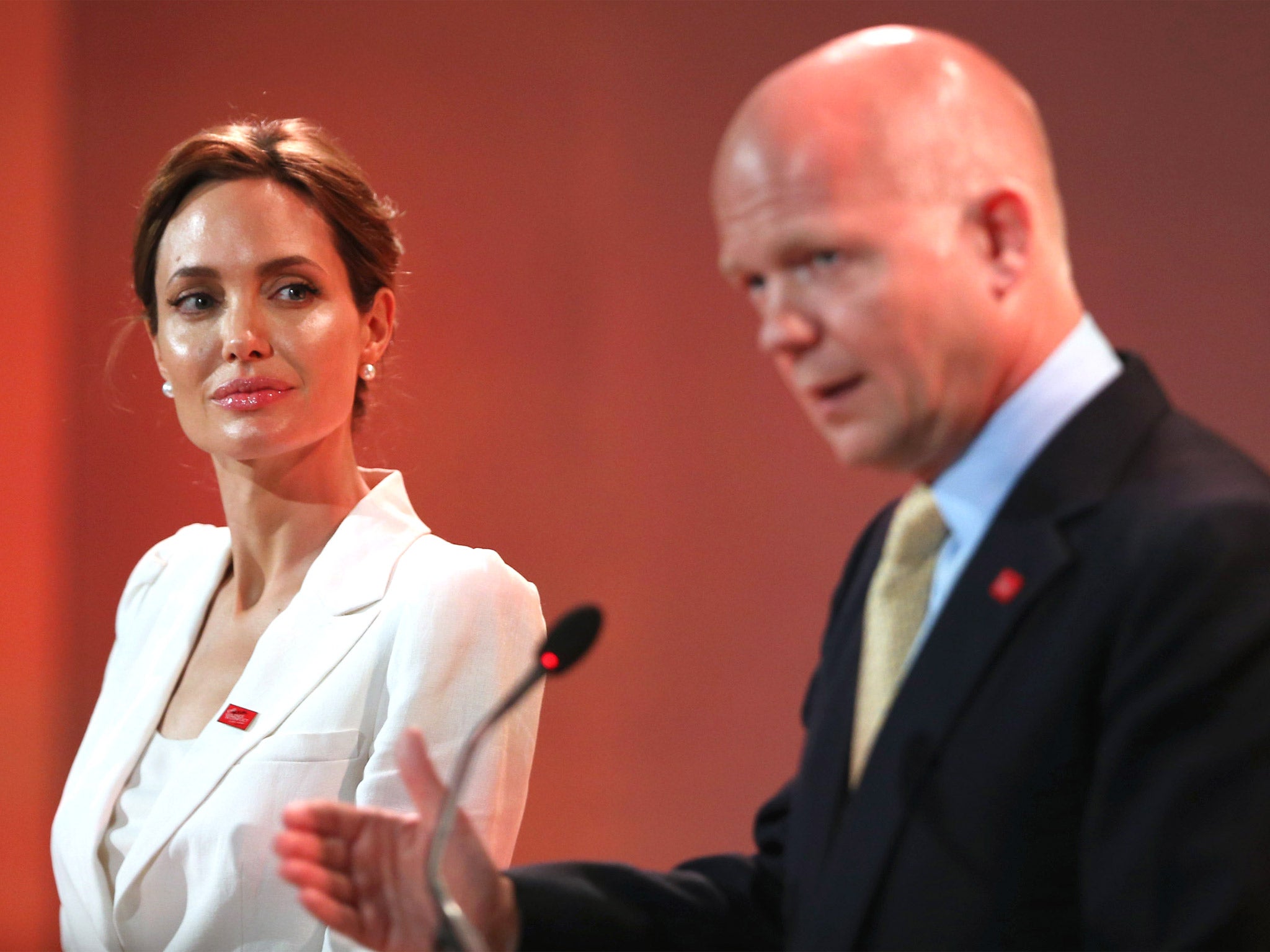 Angelina Jolie and William Hague speak at the Global Summit to End Sexual Violence in Conflict, in London