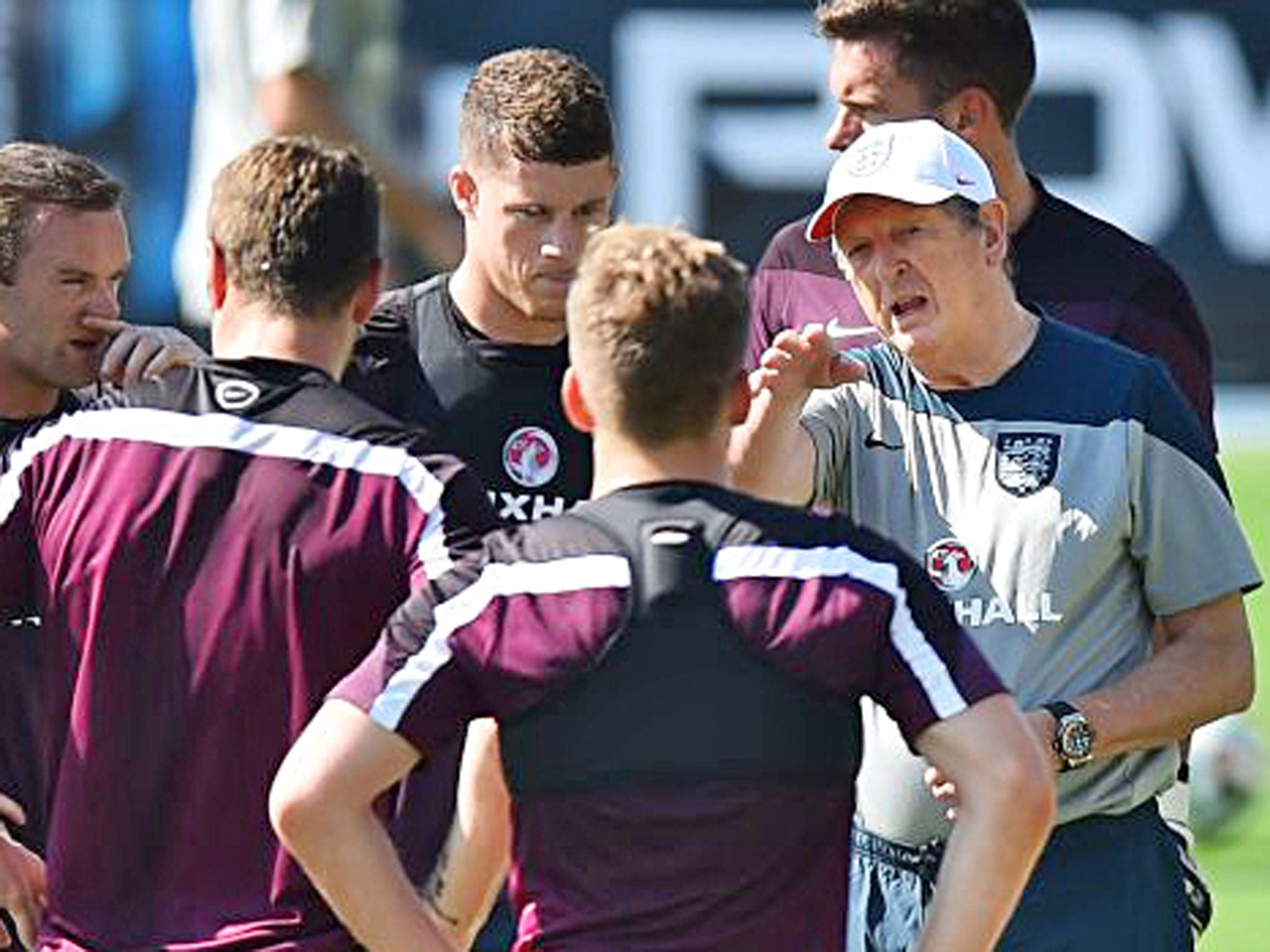 Hodgson talks tactics with the England squad in Rio earlier this week