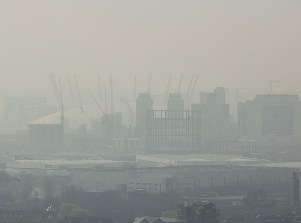 A view of the 02 Arena through smog on April 2, 2014, when dust from the Sahara combined with pollution from mainland Europe to create one of the worst smogs of the year  