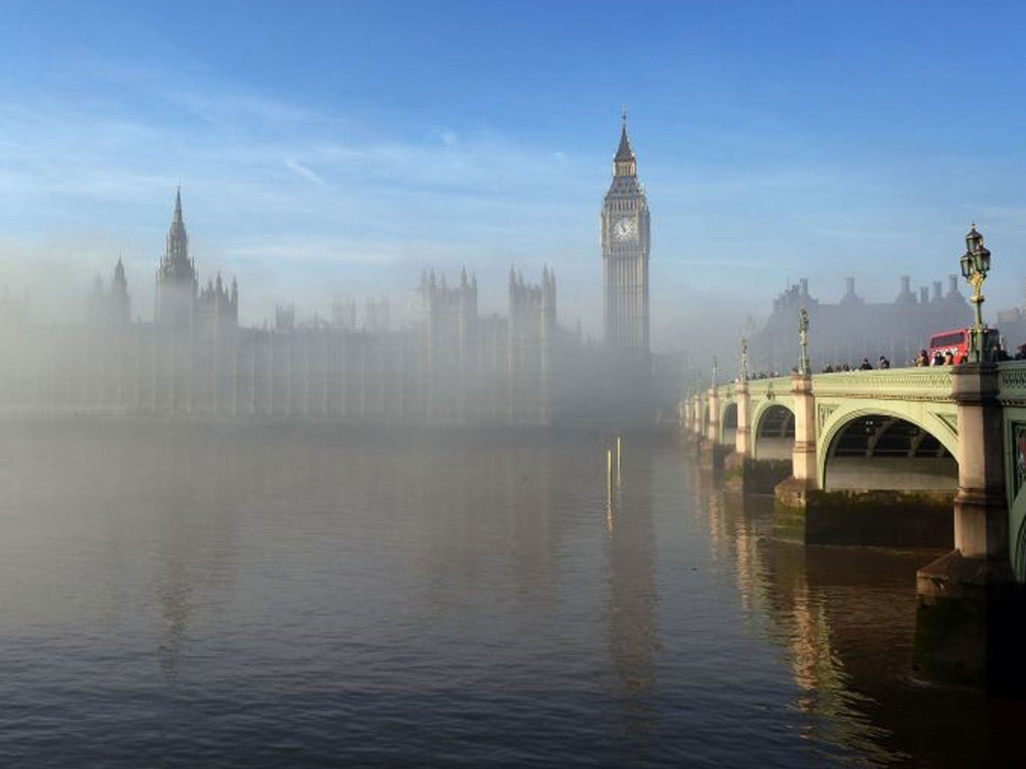 The Palace of Westminster shrouded in fog early this morning, central London
