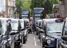 Black cab drivers blockade Trafalgar Square in fare demo