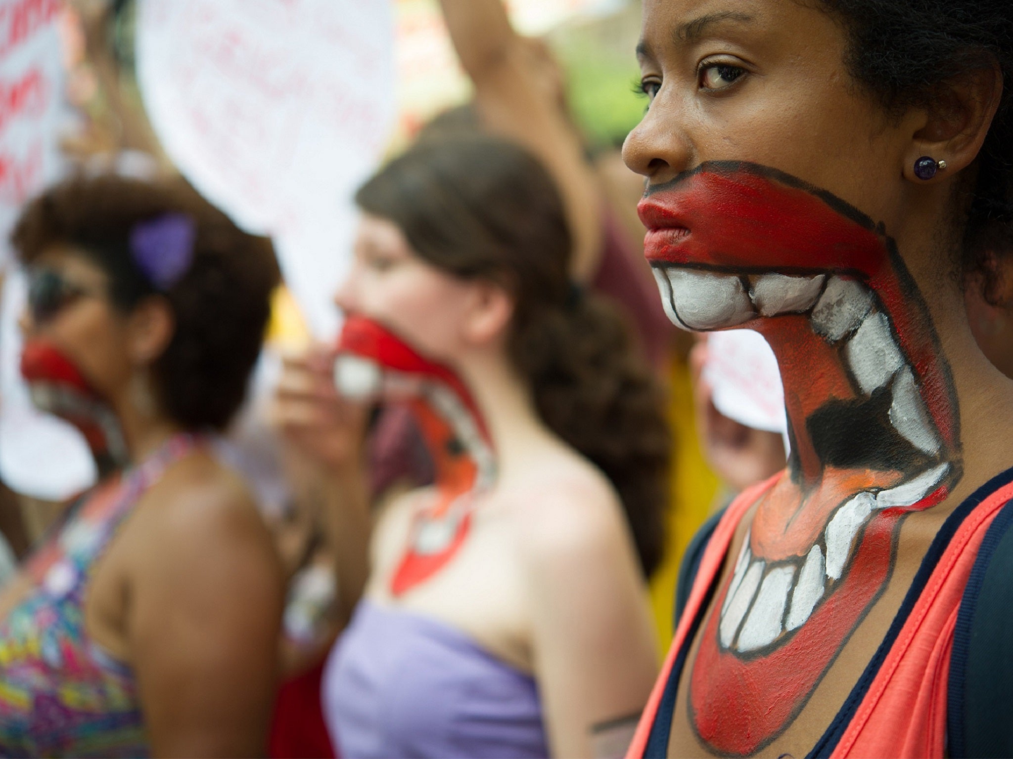 Women protest domestic violence in Brazil
