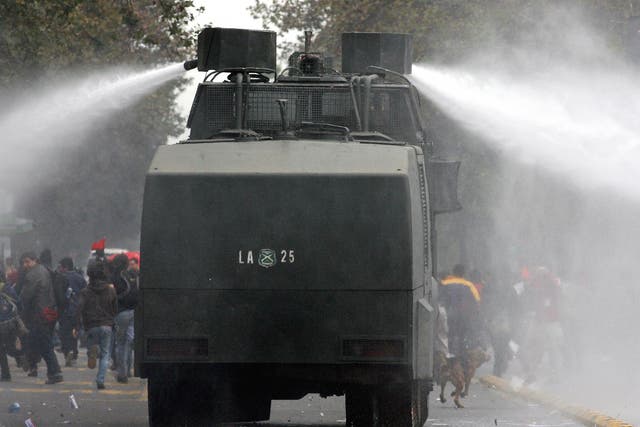 A water cannon in use in Chile