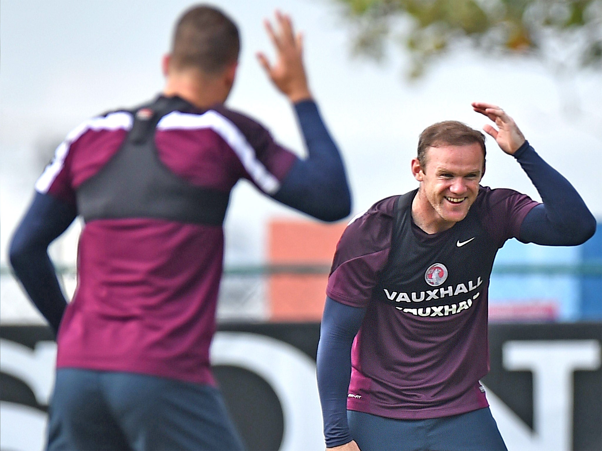 Wayne Rooney in relaxed mood during training