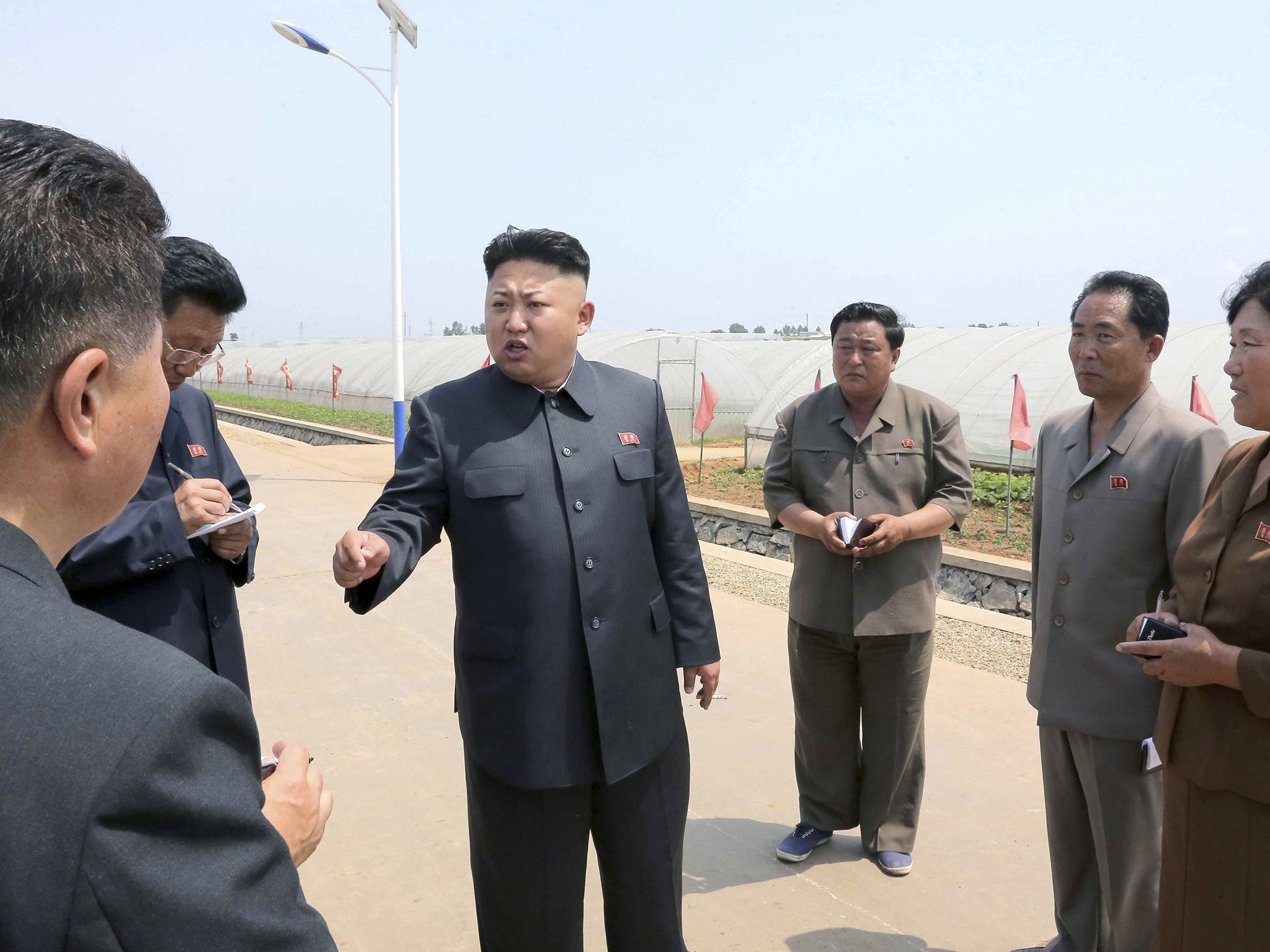 Kim Jong Un gives field guidance to the Jangchon Vegetable Co-op Farm in the Sadong District of Pyongyang