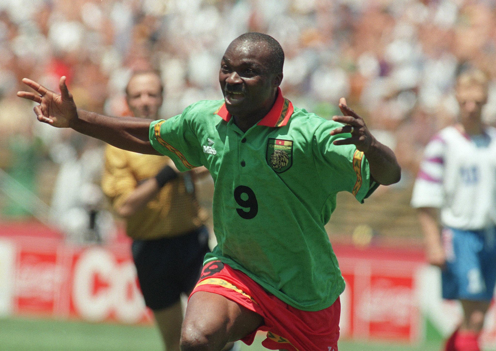 Roger Milla celebrates scoring against Russia in the 1994 World Cup