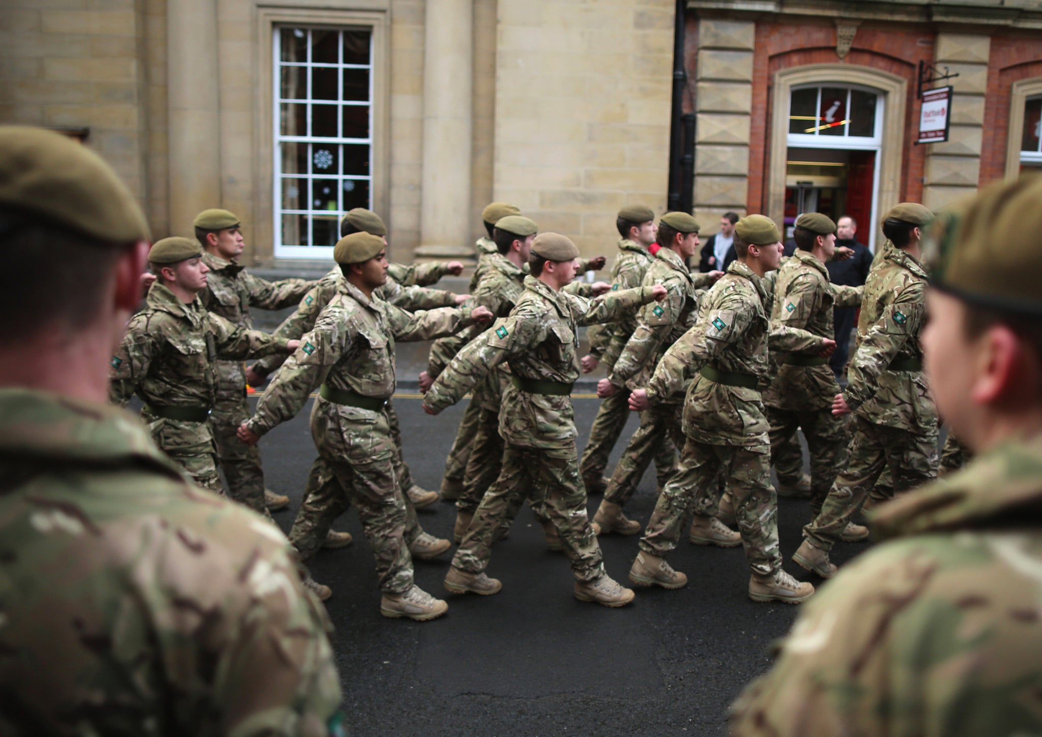 Soldiers from 3rd Battalion The Yorkshire Regiment march through the streets of York during a homecoming parade on December 5, 2012 in York, England.
