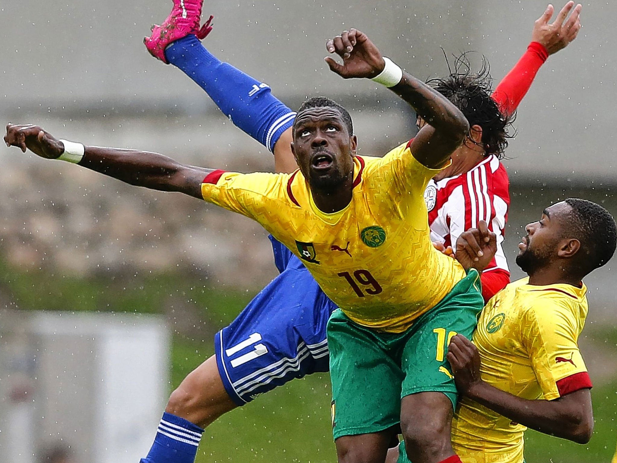 Cameroon’s Idrissou Mohammadou (left) in action in a friendly against Paraguay last month