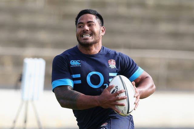 Manu Tuilagi runs with the ball during the England training session