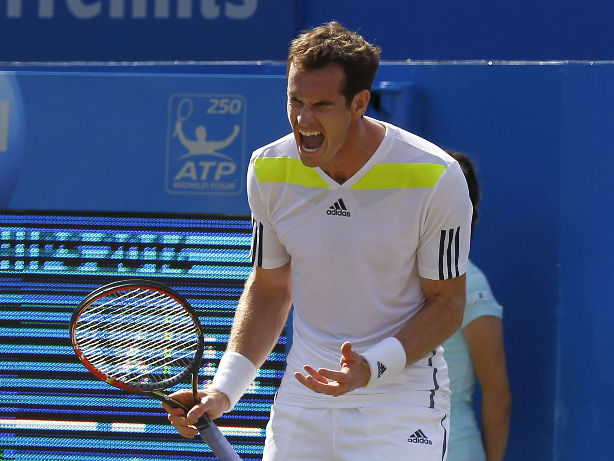 A frustrated Andy Murray on his way to defeat against Radek Stepanek at Queen’s
yesterday