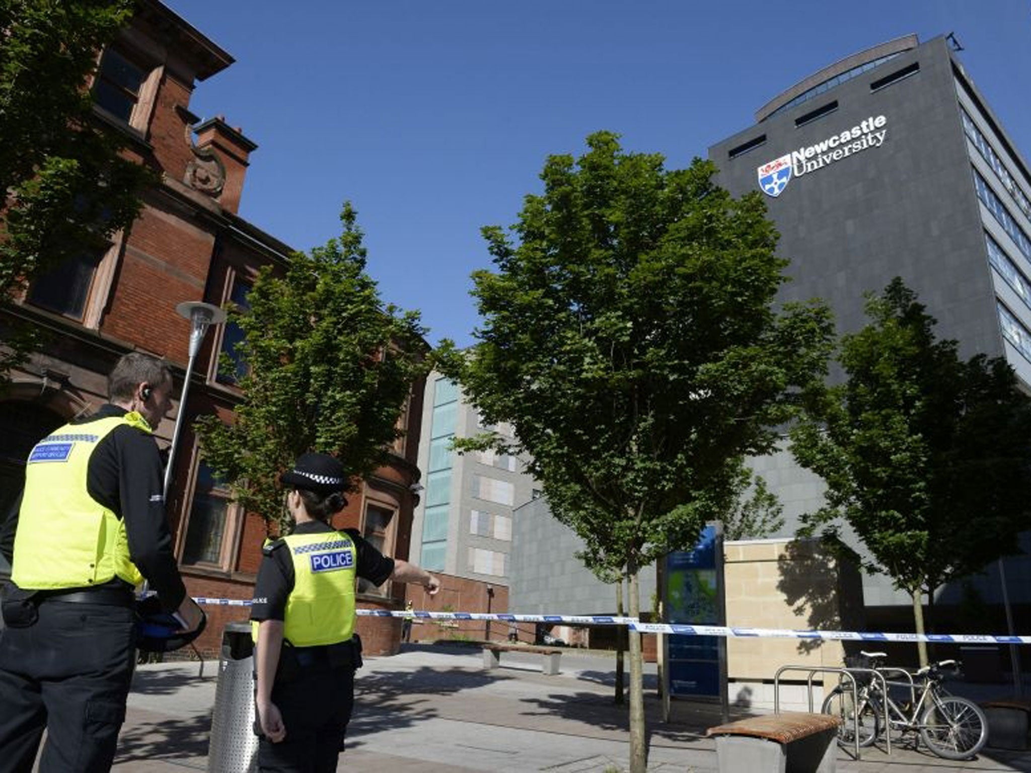 Police outside a Newcastle University building in Newcastle, after it was sealed off in connection with "suspicious items" found earlier this week. PRESS ASSOCIATION Photo. Picture date: Thursday June 12, 2014. Two 18-year-old Russian students studying at