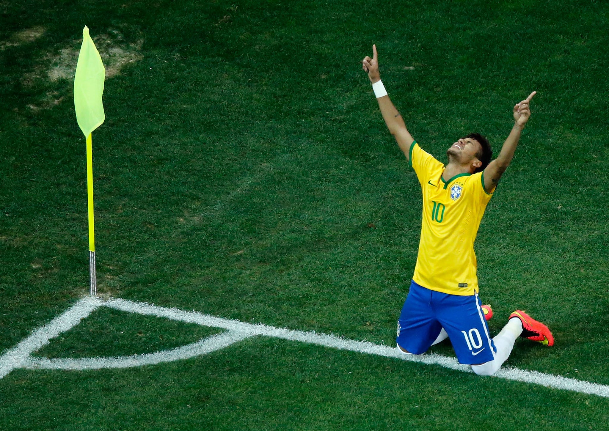 Neymar celebrates scoring his second goal against Croatia in the opening game of the World Cup 2014