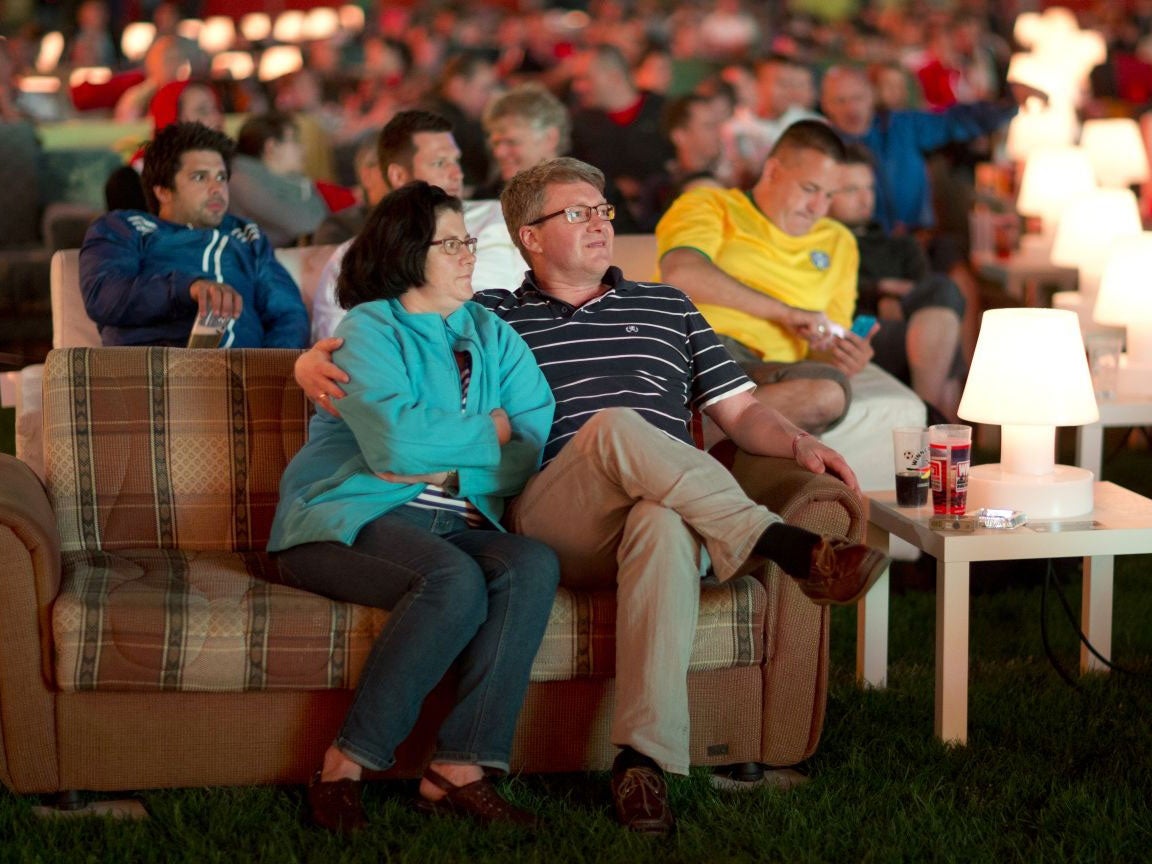 German football fans watch the opening game of the World Cup 2014