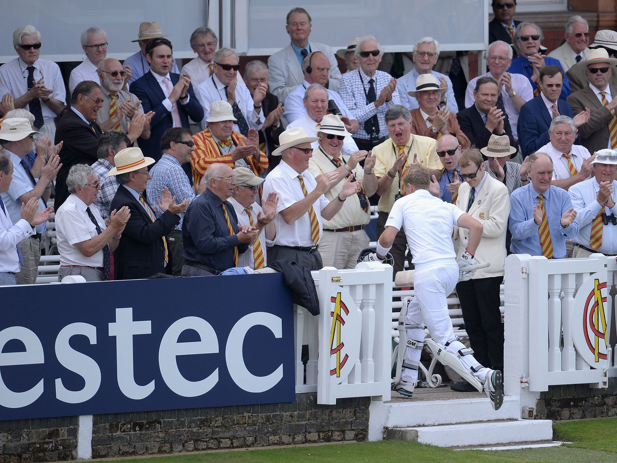 Root returns to the pavilion among a standing ovation for his double-hundred