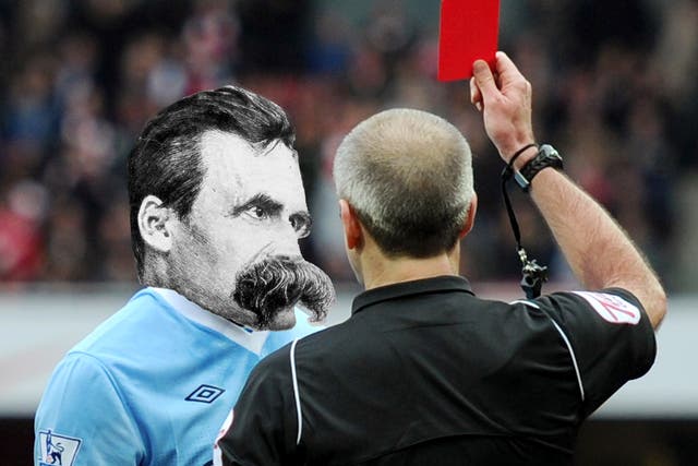 Nietzsche gets sent off the field by a football referee