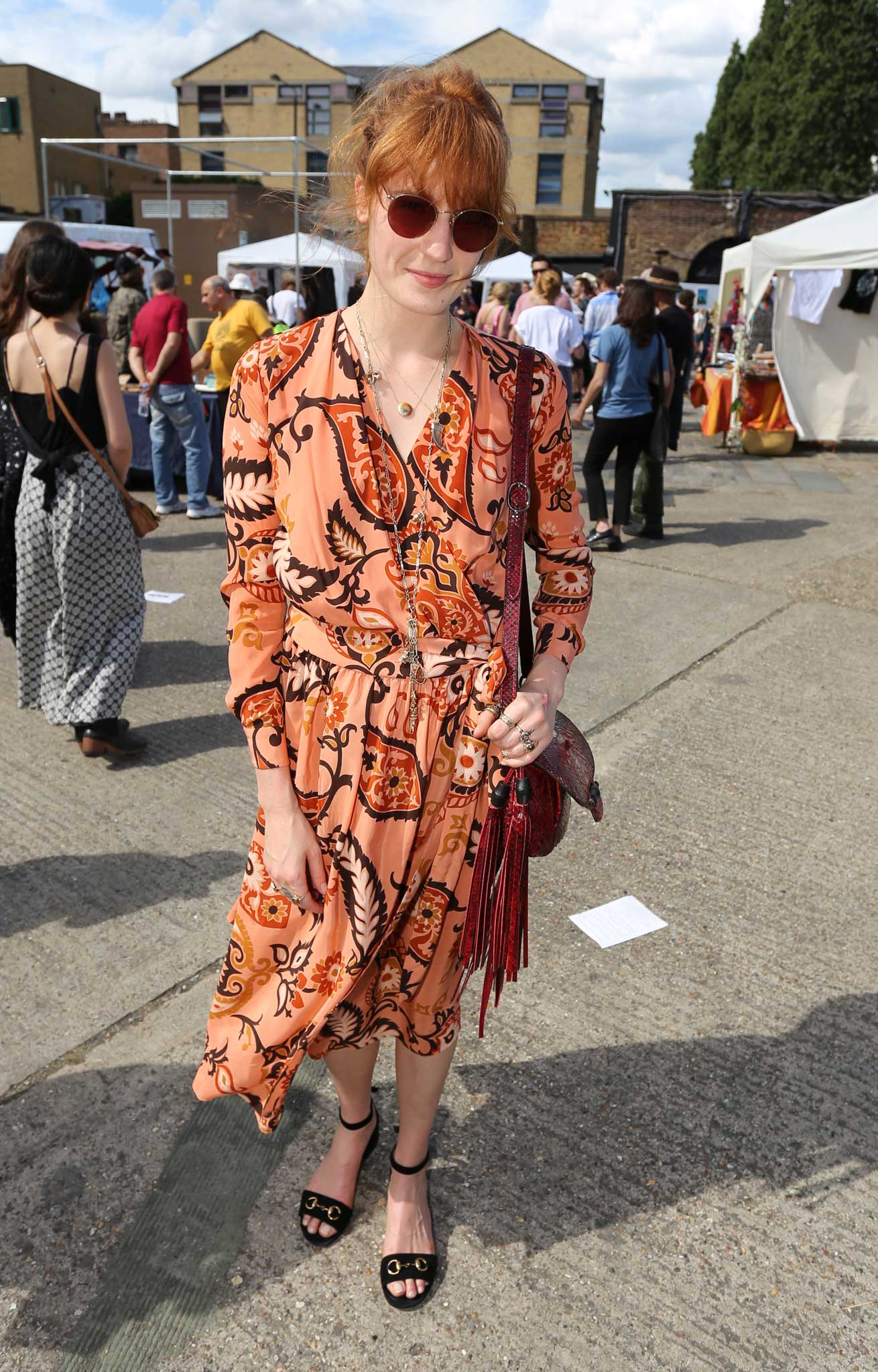 Pretty in peach paisley: Florence Welch on Brick Lane in London
