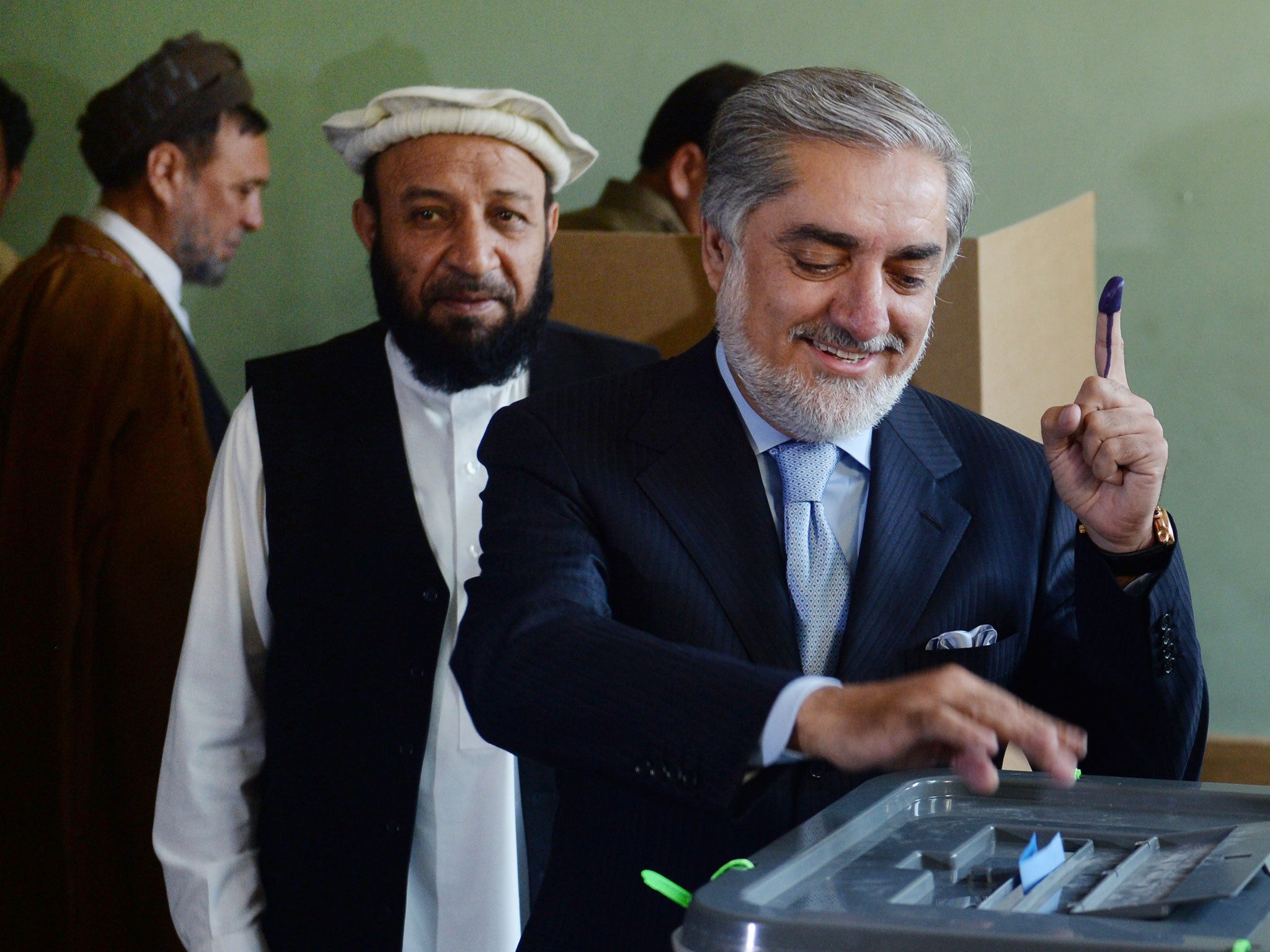 Abdullah Abdullah, like his rival Ashraf Ghani Ahmadzai, has promised to sign a long-delayed security pact with the United States