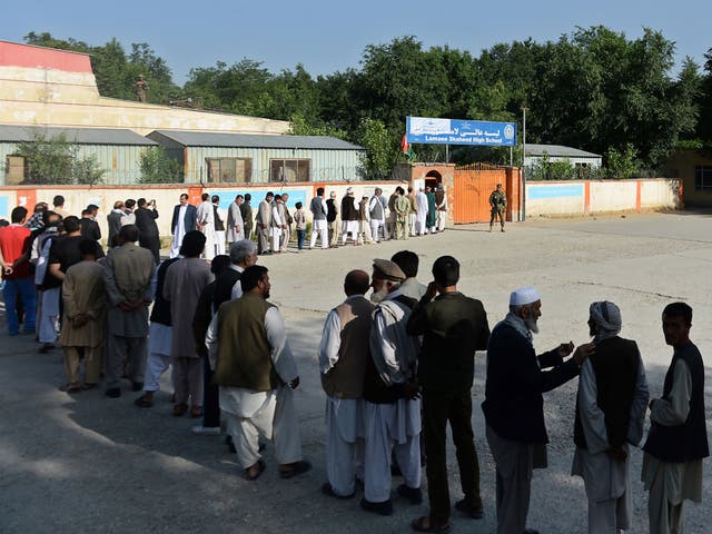 The Taliban have intensified attacks ahead of the vote and warned people to stay away from the polls, but only minor violence was reported by midday