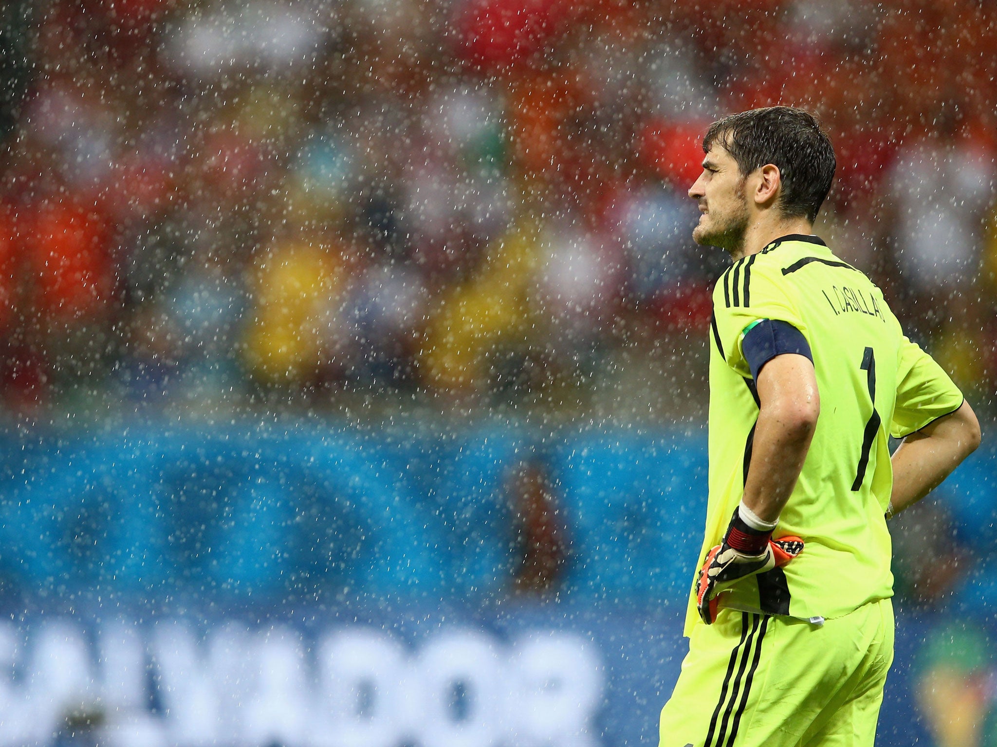 A downbeat Iker Casillas looks on during the heavy defeat in Salvador