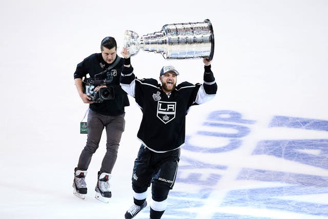 Marian Gaborik #12 of the Los Angeles Kings celebrates with the Stanley Cup after the Kings 3-2 double overtime victory against the New York Rangers