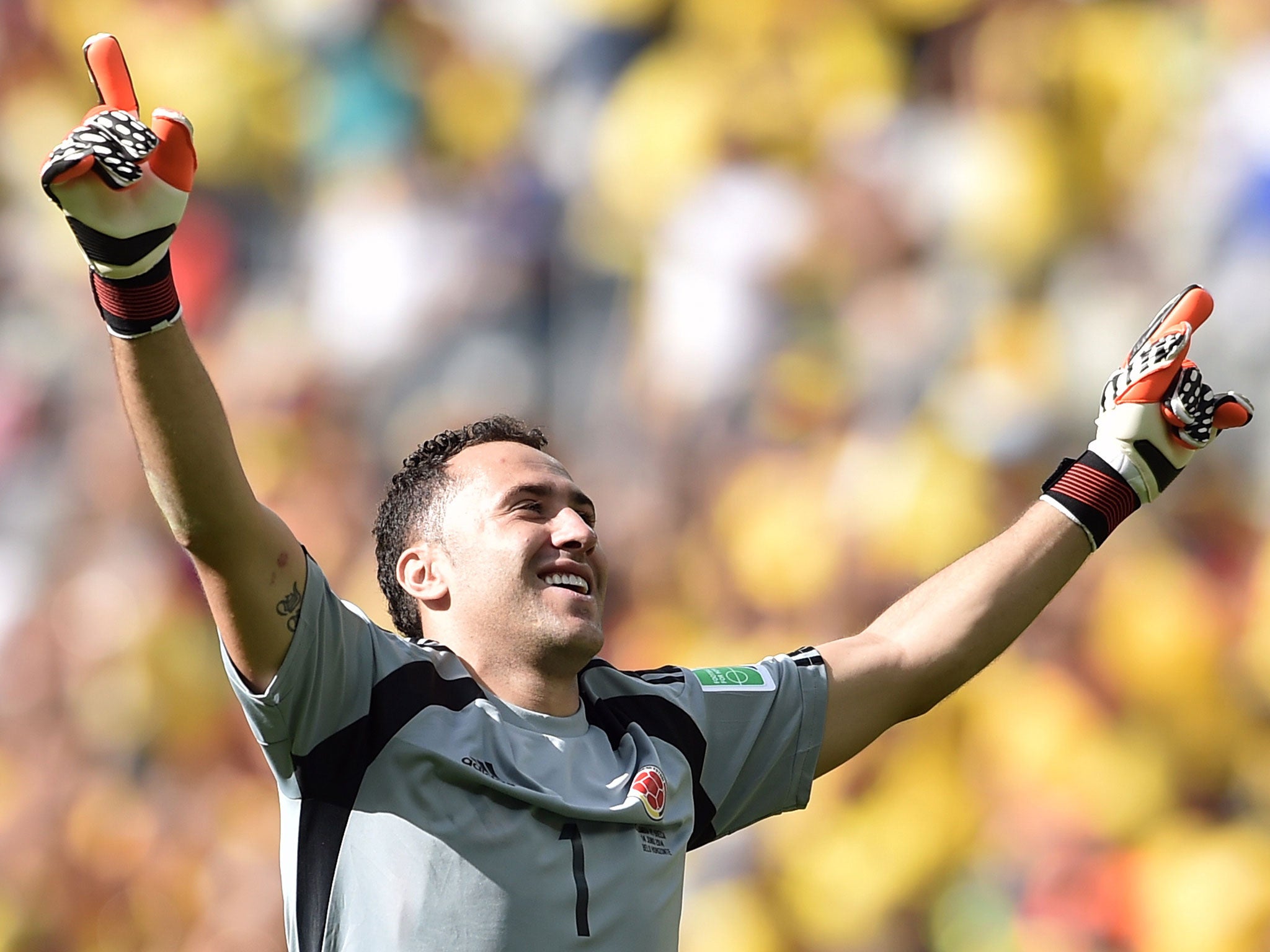 Ospina celebrates during the game