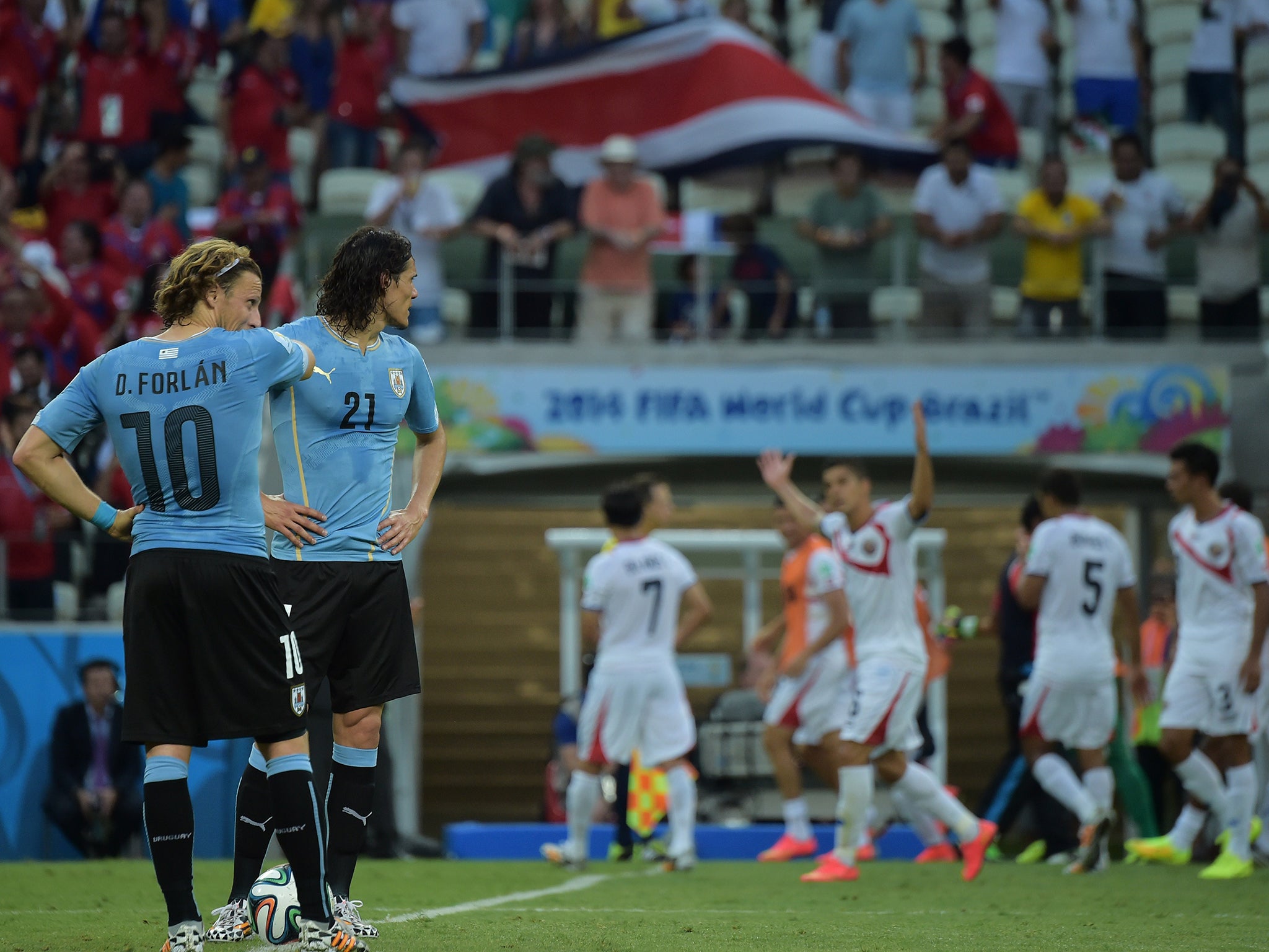 Costa Rica celebrate during their 3-1 win over Uruguay